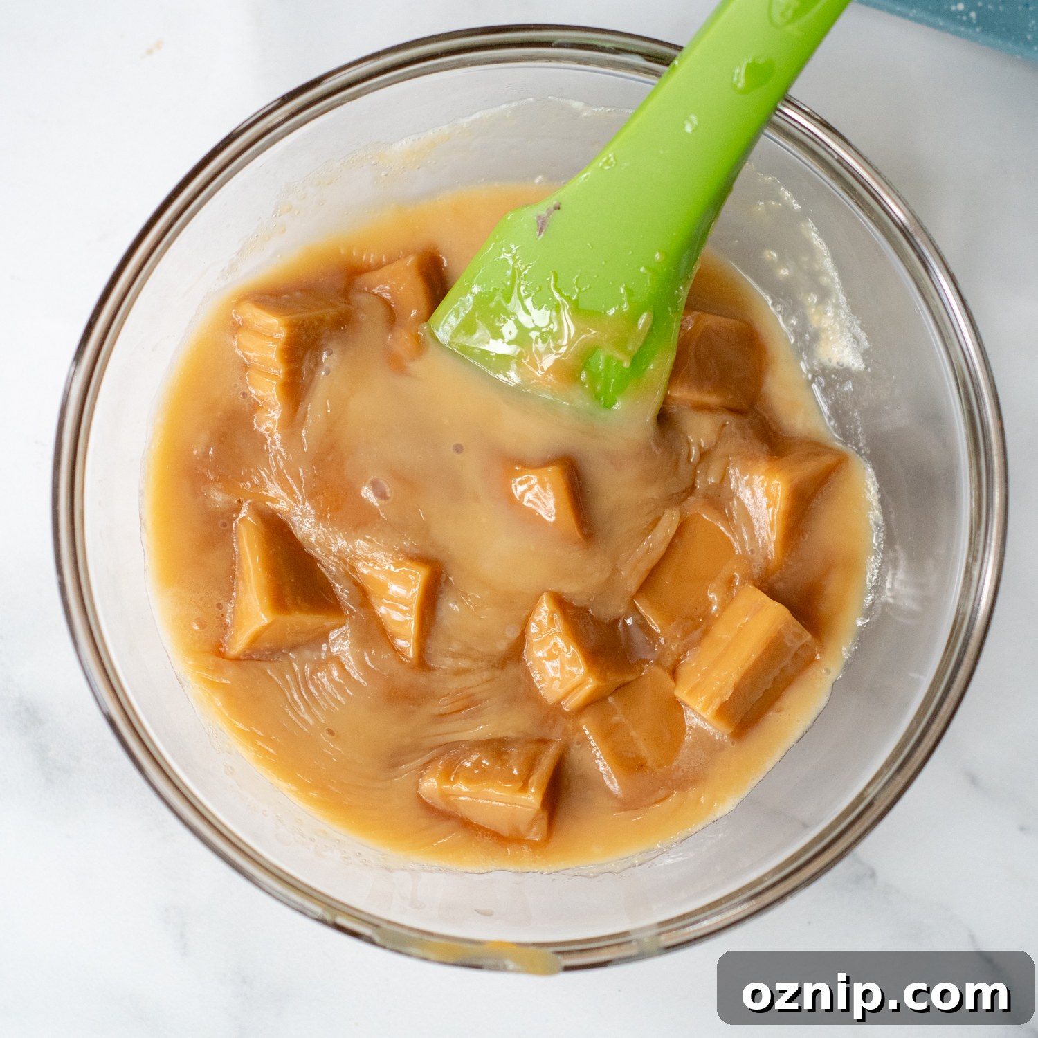 partially melted caramels in a glass bowl.