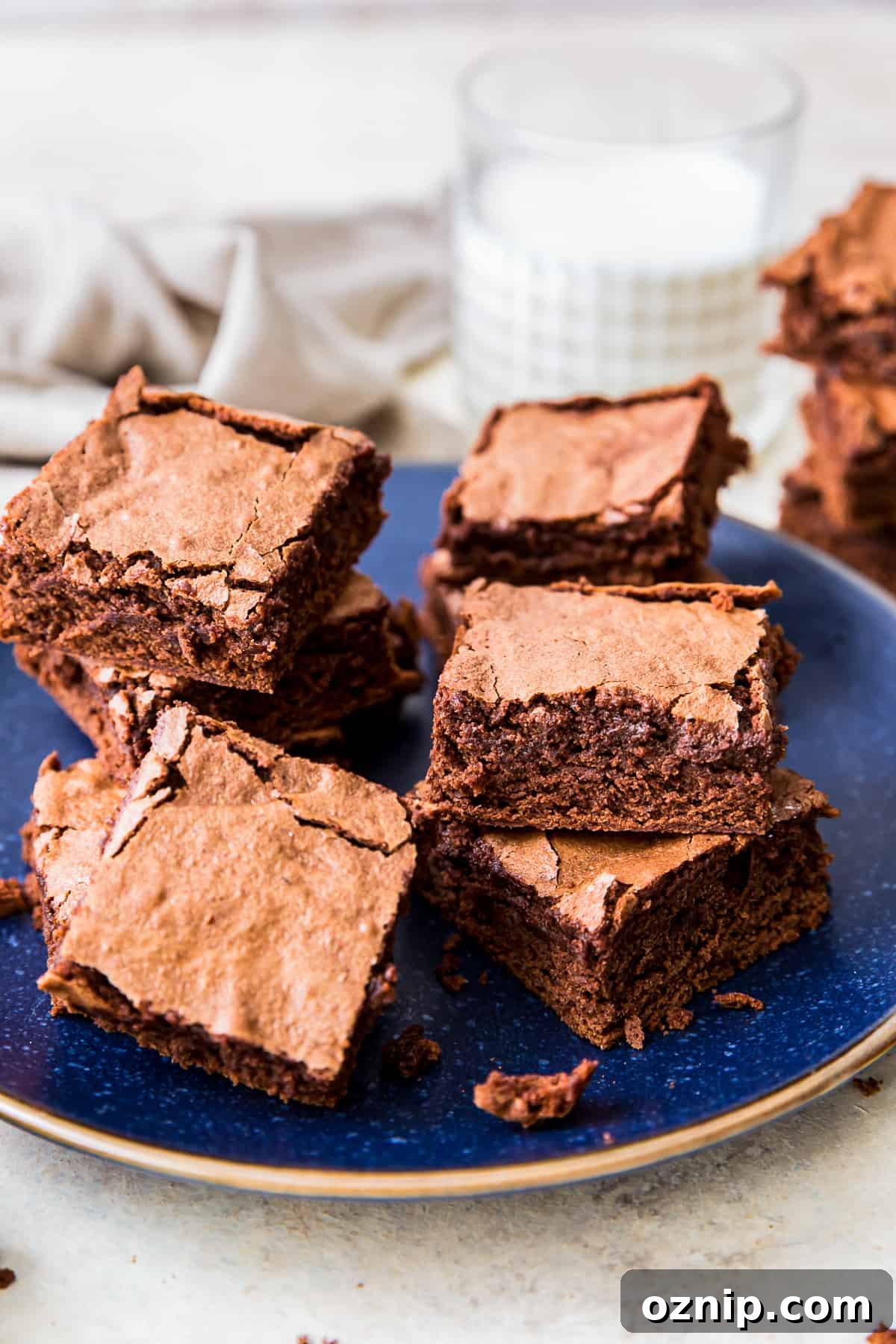 cakey brownies on a blue serving plate.