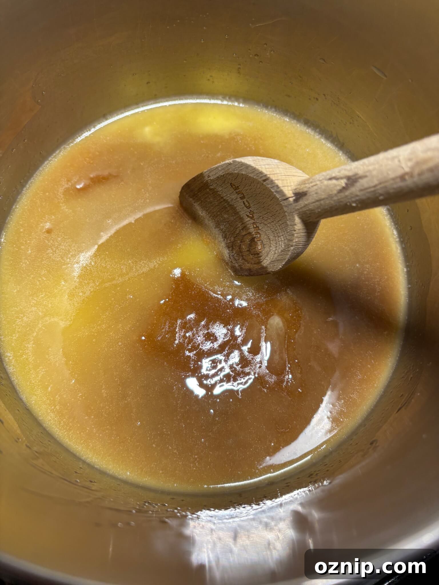 Gluten-Free Christmas Bark Recipe 5 Butter and brown sugar melting in a pot