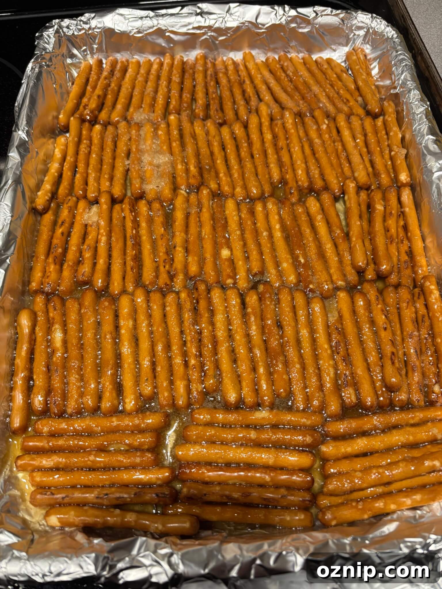 Gluten-Free Christmas Bark Recipe 7 Caramel mixture poured over gluten-free pretzels