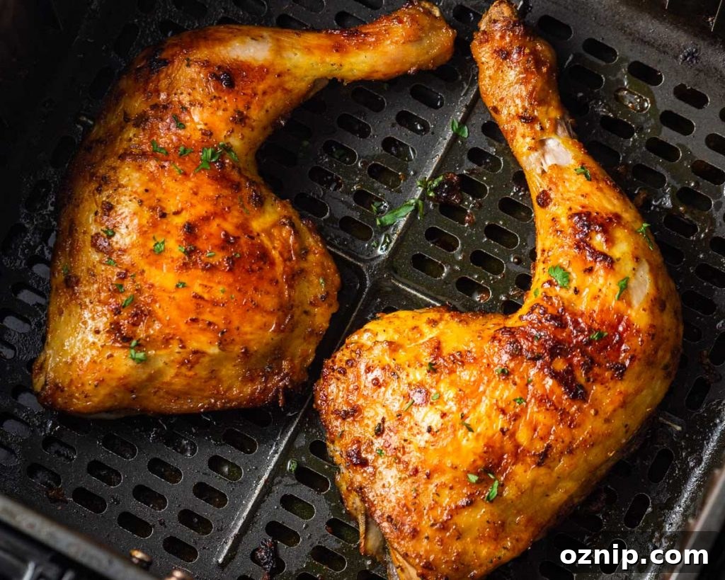 air fryer chicken legs in the air fryer basket.