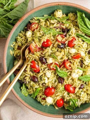 bowl of orzo pesto pasta salad