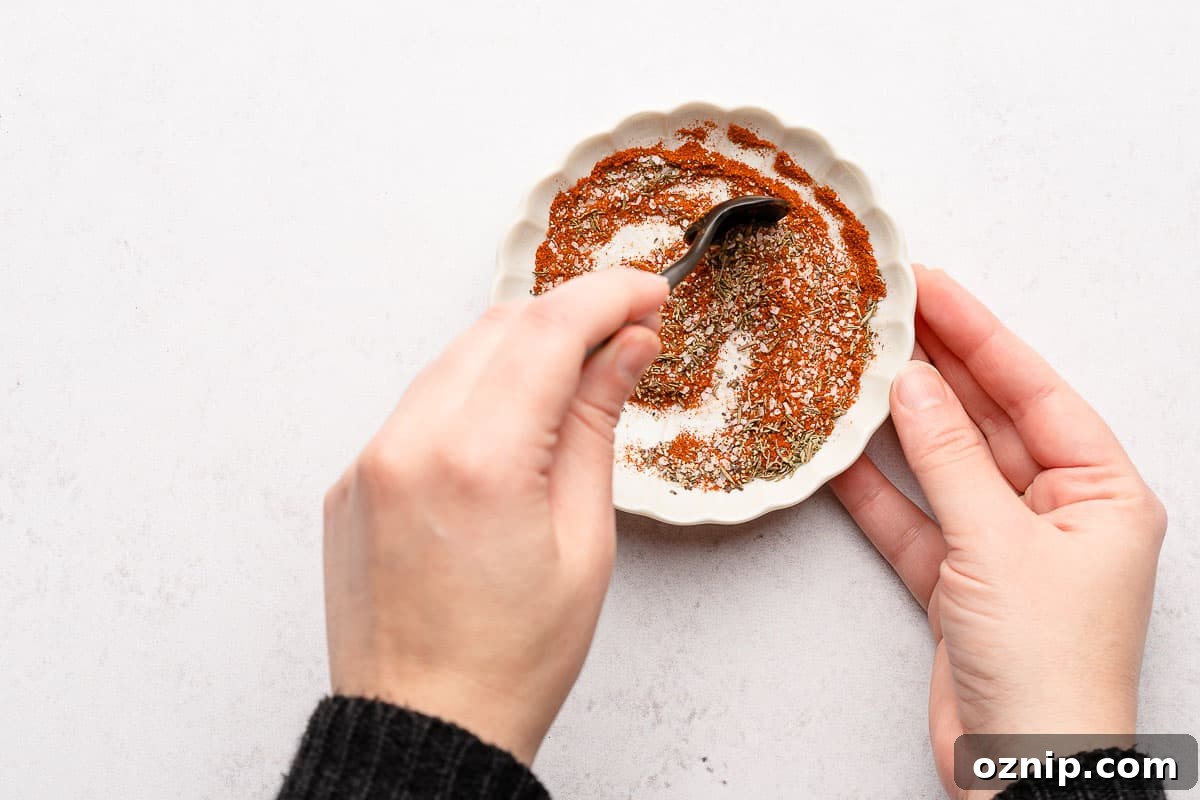 spices being stirred together in small dish