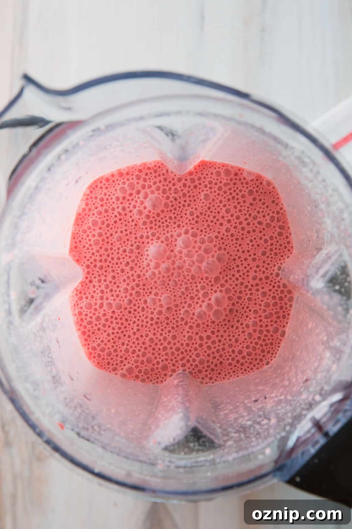 smoothie ingredients in a blender before and after blending