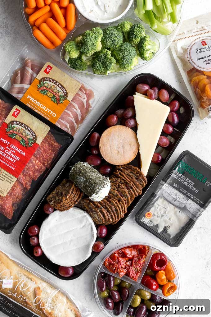 Overhead view of items purchased for cheese board.
