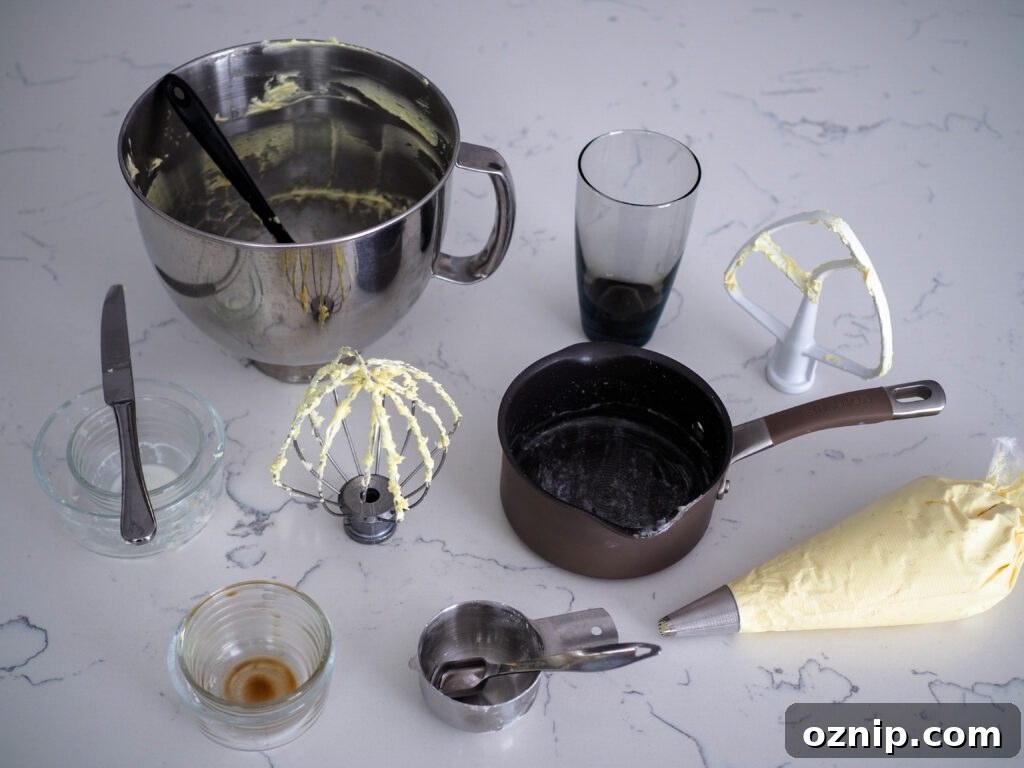 A variety of dishes used to make birthday cake batter flavored French buttercream.