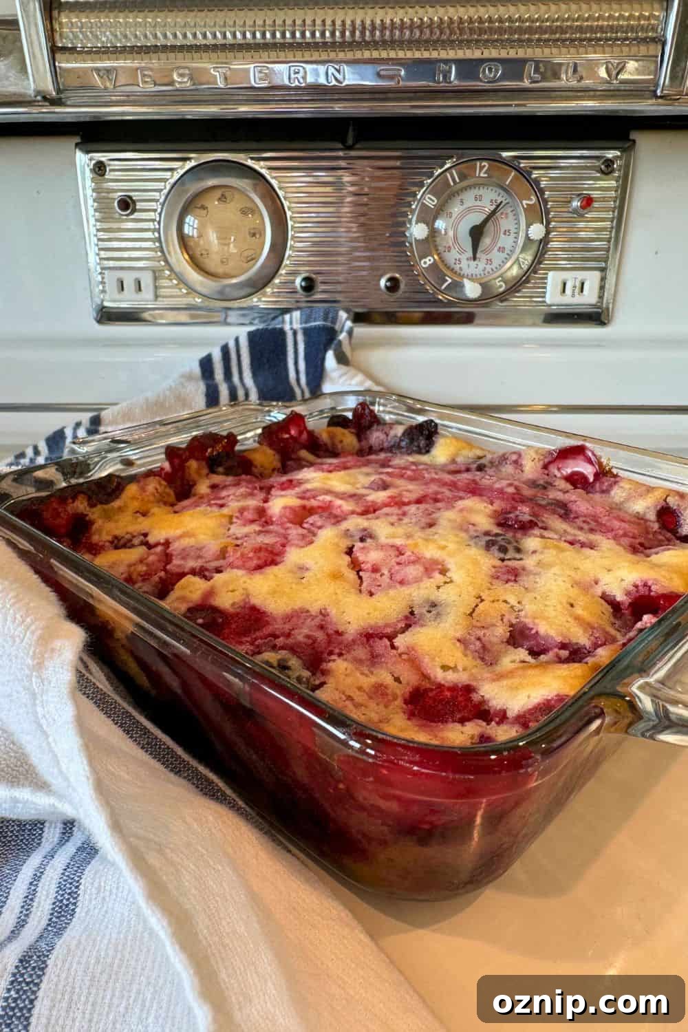 letting blackberry cobbler cool on stove top