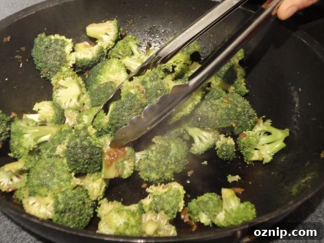 Broccoli and Oyster Sauce Being Stir Fried