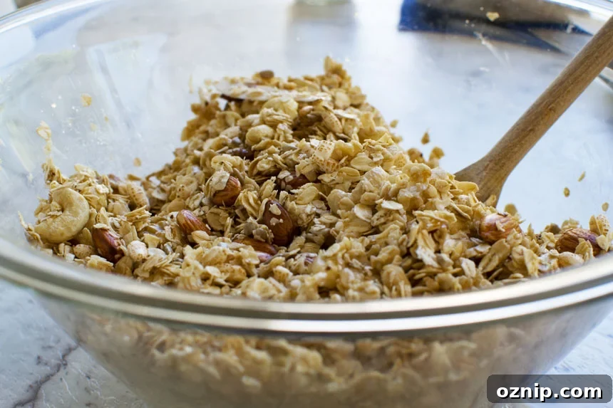 Homemade Low Sugar Granola: Crunchy Morning Recipe 4 Ingredients for homemade granola in a big glass bowl