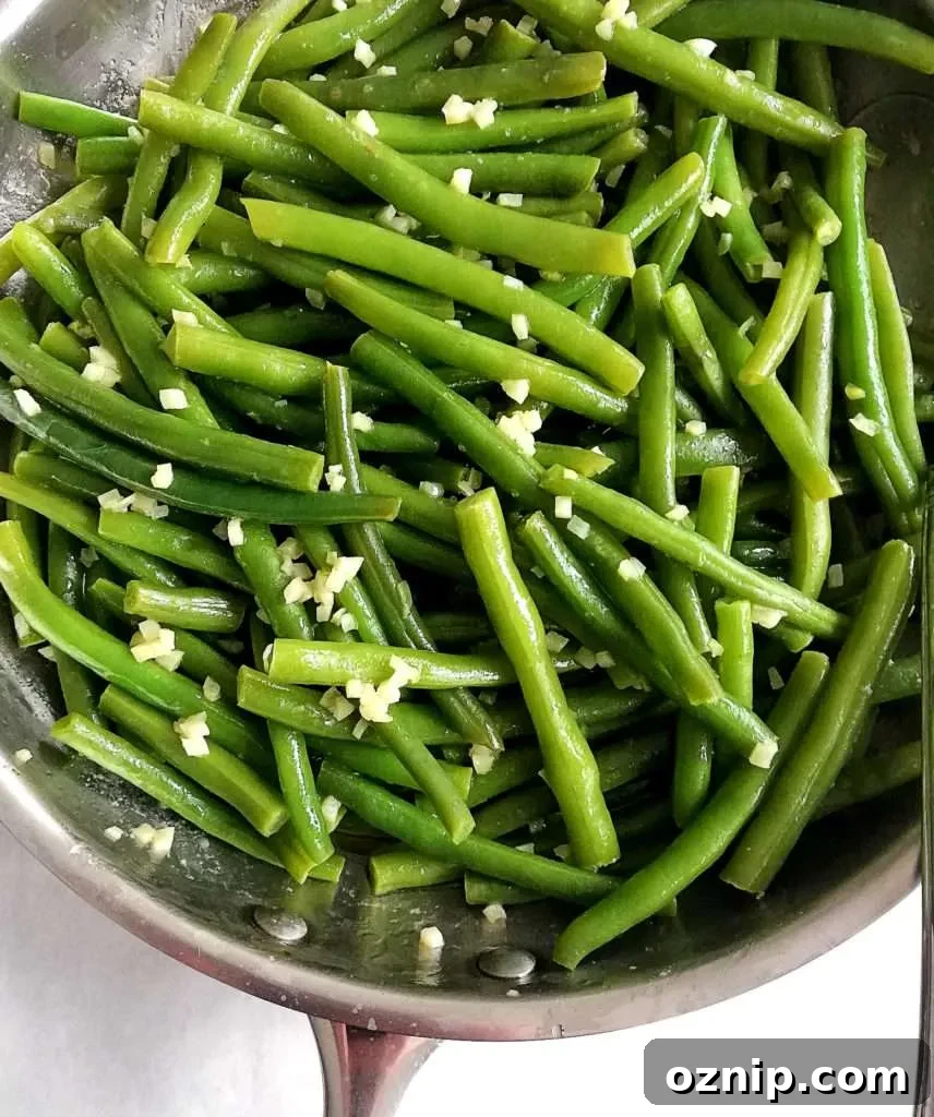 Top 7 Thanksgiving Side Dishes to Make This Year 5 garlic green beans in skillet close up