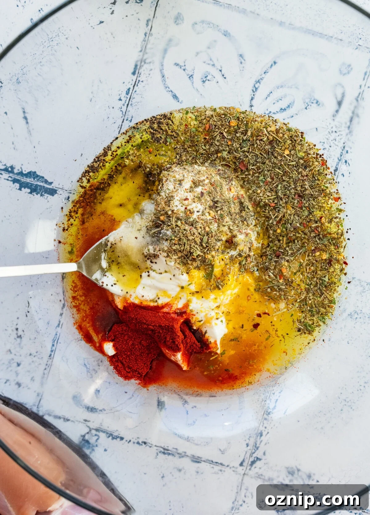 Greek Yogurt Chicken Marinade for Juicy Grilled Chicken 7 Chicken marinade ingredients in a bowl before combining.