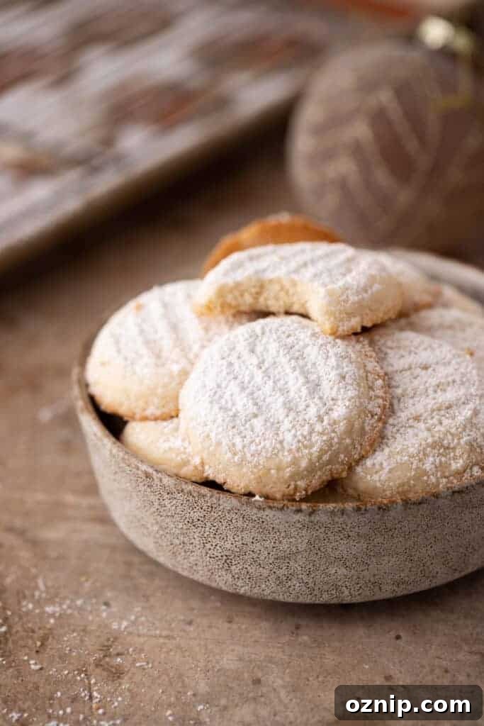 Melting Moments Cookies Recipe That Melt in Your Mouth 4 bowl full of cornstarch cookies