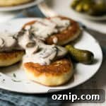 Potato cutlets with creamy mushroom and dill sauce
