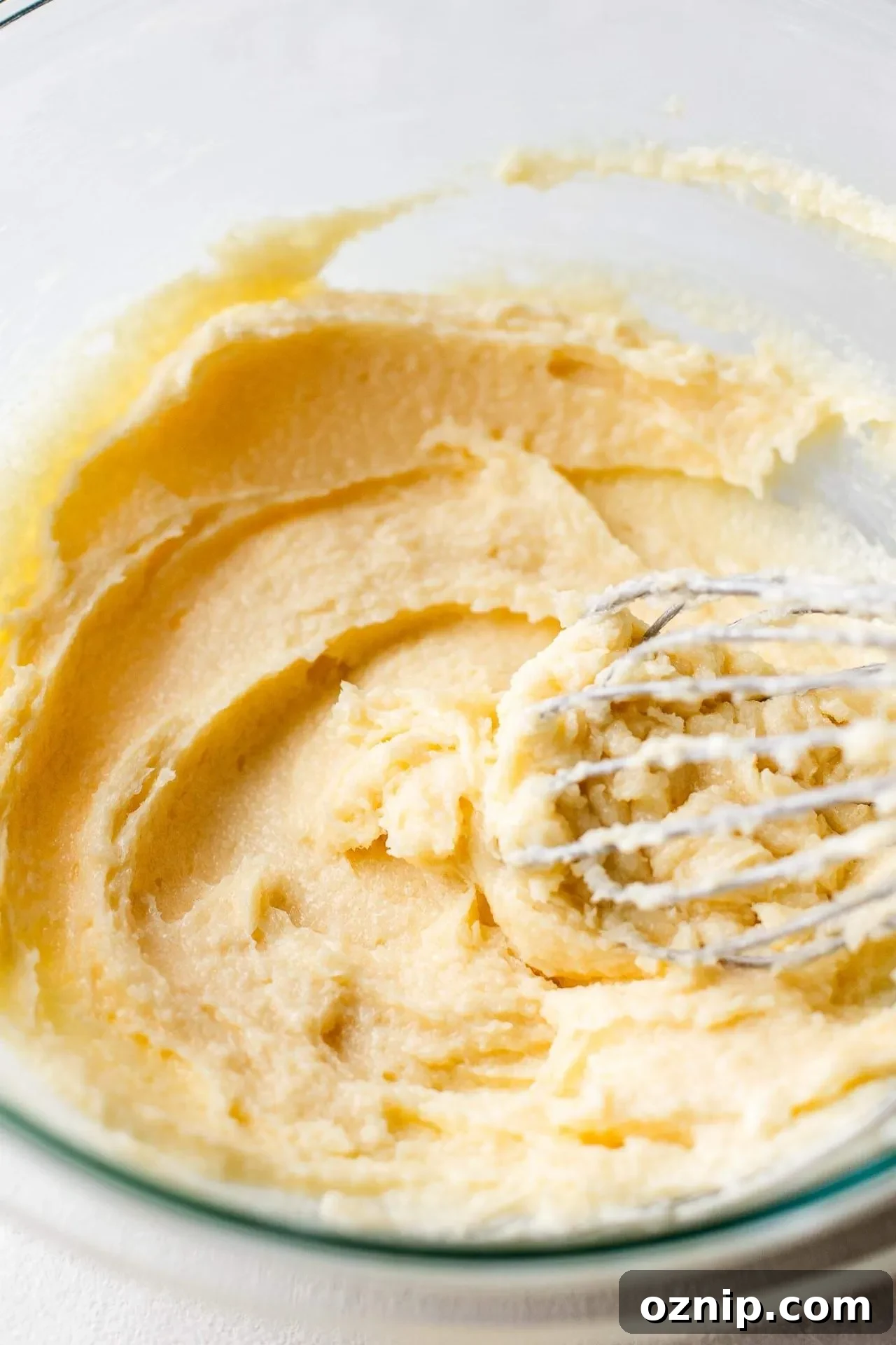 butter and sugar creamed together in bowl