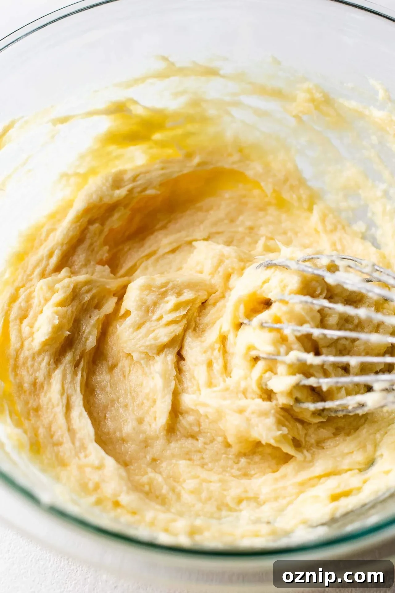 wet ingredients for cookie dough all mixed together in bowl