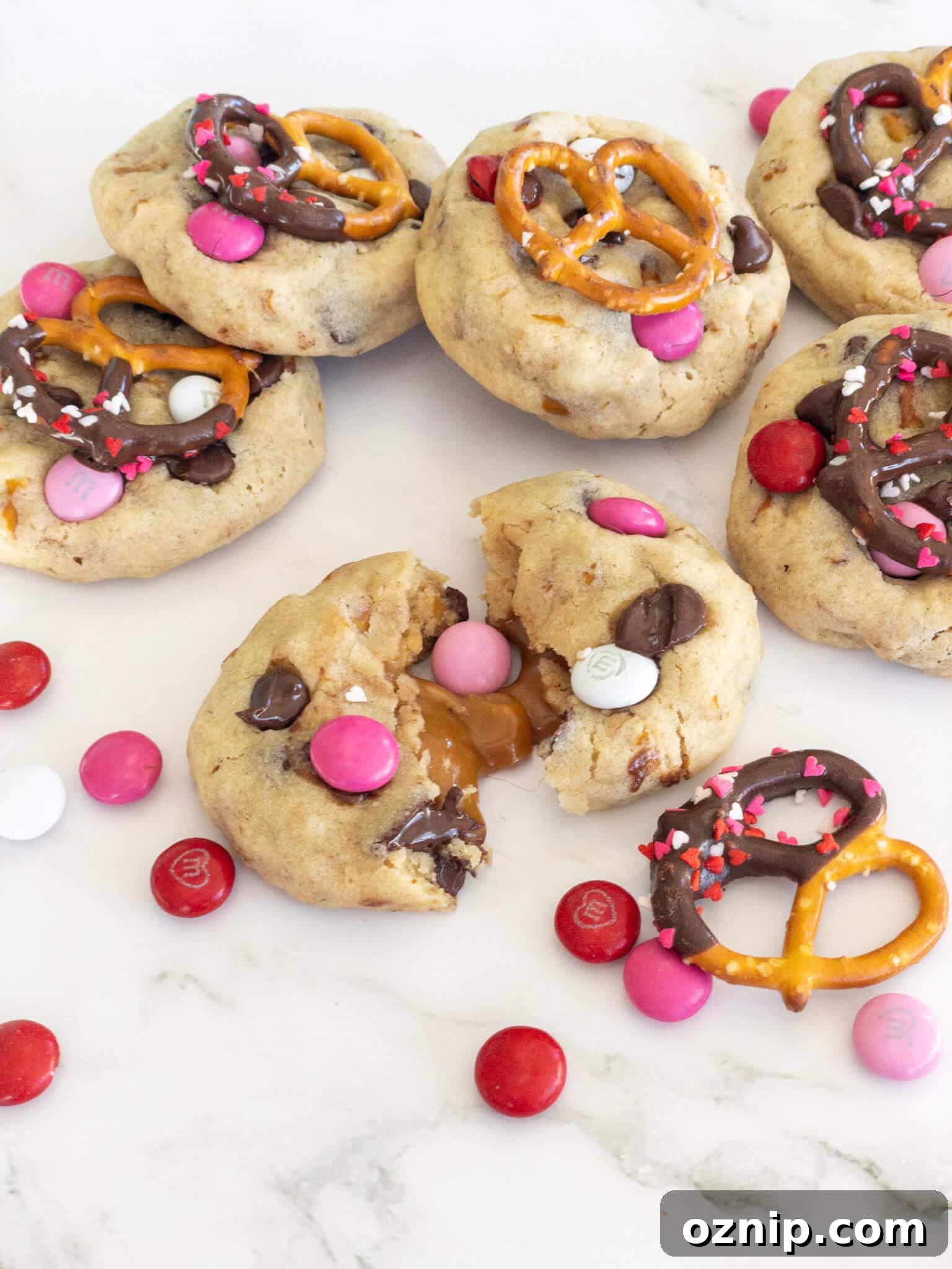 Salted Caramel Pretzel Chocolate Chip Cookies with gooey caramel filling