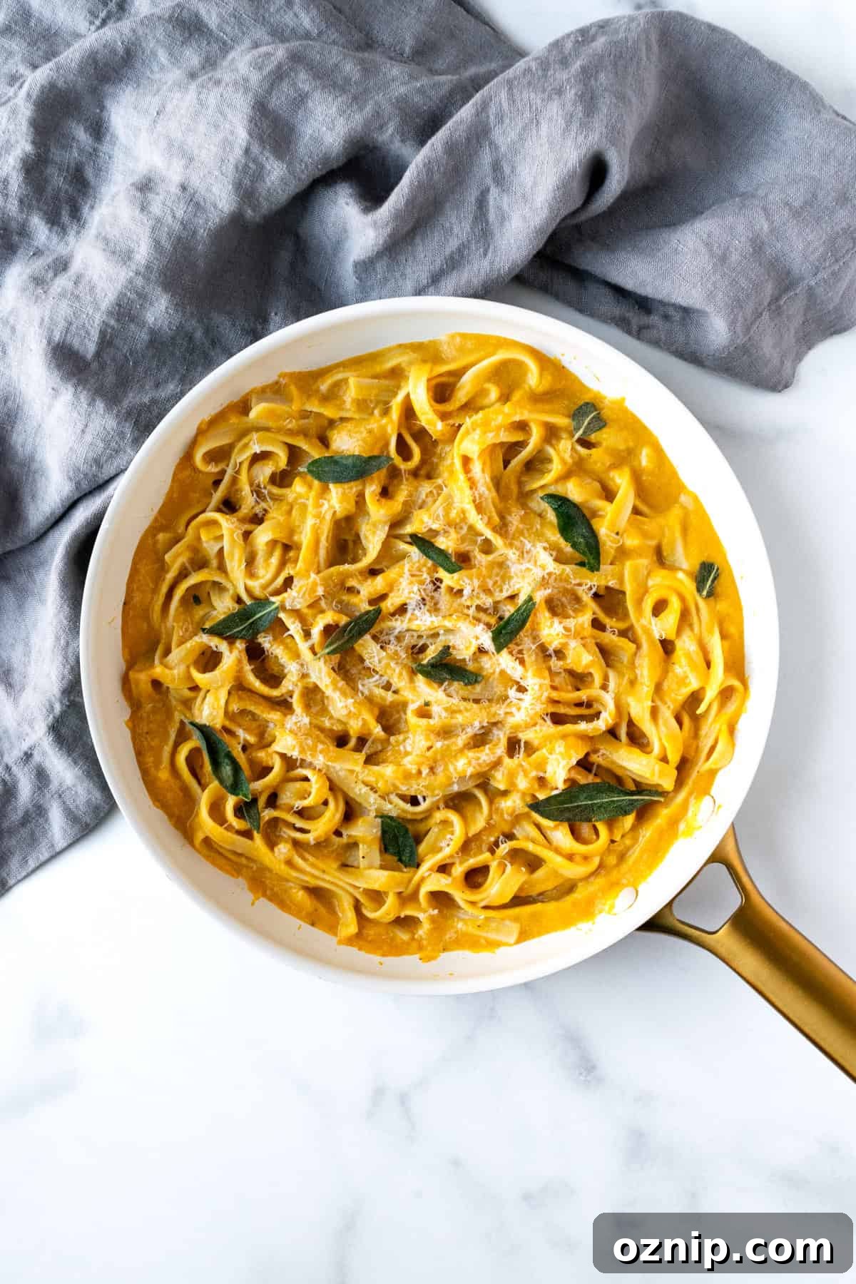 Creamy Pumpkin Fettuccine Alfredo Recipe 5 Creamy Pumpkin Pasta in a white skillet.