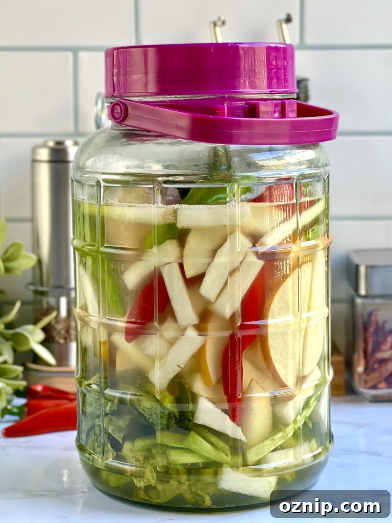 Quick Dongchimi: Radish Water Kimchi Recipe 4 Fermenting dongchimi in a jar