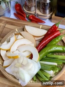 Quick Dongchimi: Radish Water Kimchi Recipe 8 Melon and aromatics for dongchimi