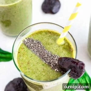 Healthy prune smoothie in a glass with chia seeds.