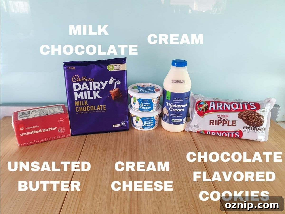 Ingredients, unsalted butter, milk chocolate, cream cheese, thickened cream, chocolate flavored cookies, lemon juice (not pictured)