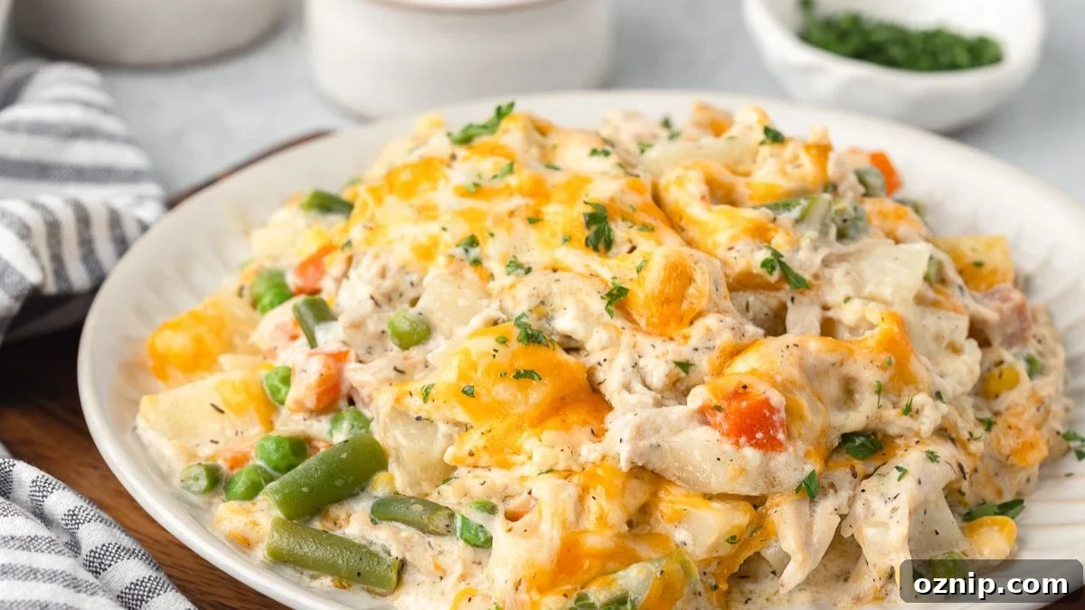 Chicken and potato casserole on a white plate.
