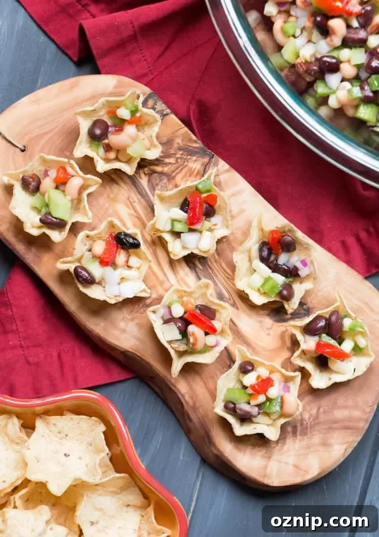 Jalapeno Bean Salsa. Lightly sweet with a bit of heat, this salsa gets recipe requests every where it goes! It's a great make ahead recipe.
