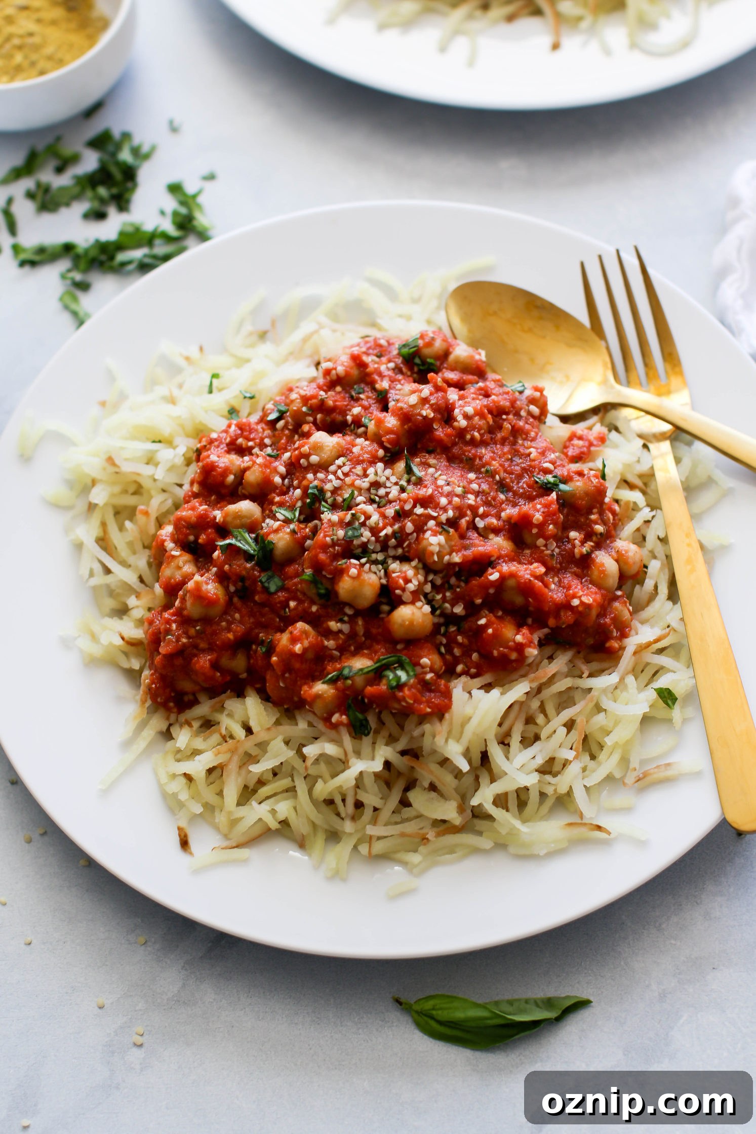 Chickpea & Hemp Heart Bolognese with White Sweet Potato Spirals