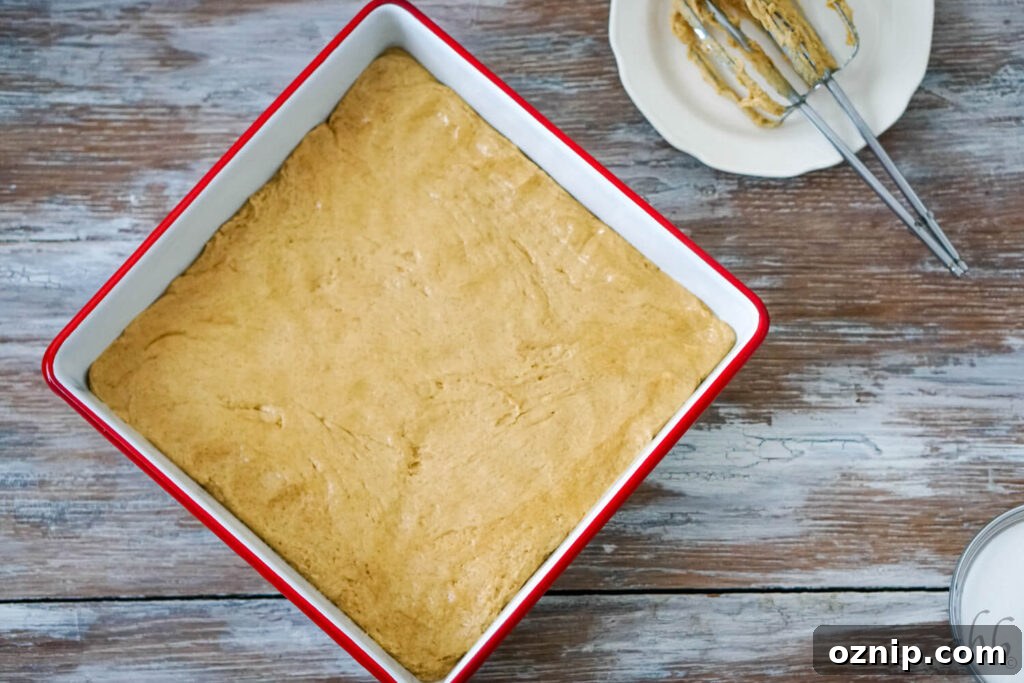 Pressing dough into pan
