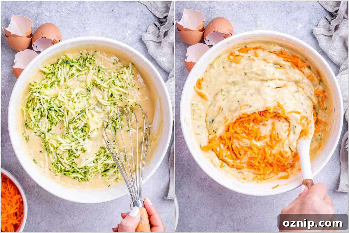 process shot for adding shredded zucchini and carrots to batter.