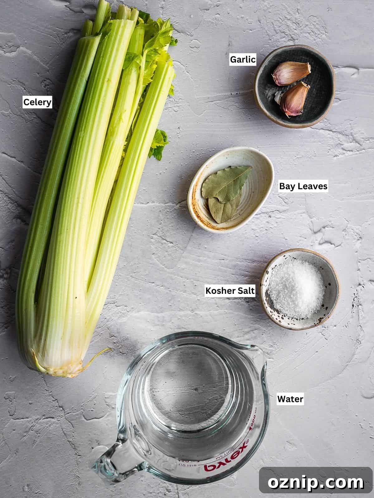 Fermented celery recipe ingredients with individual labels on a board.