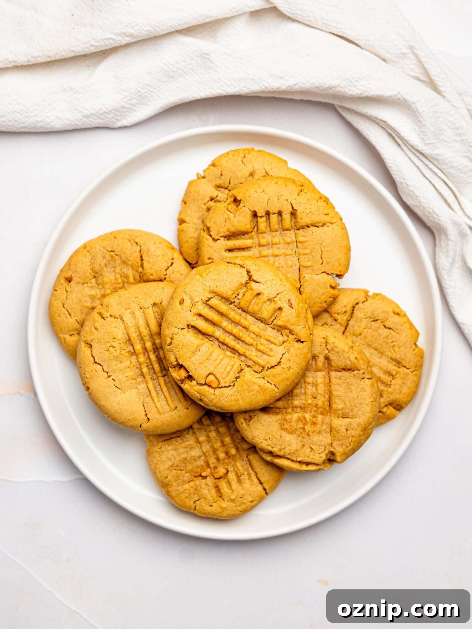 Peanut butter cookies no butter on a white plate.