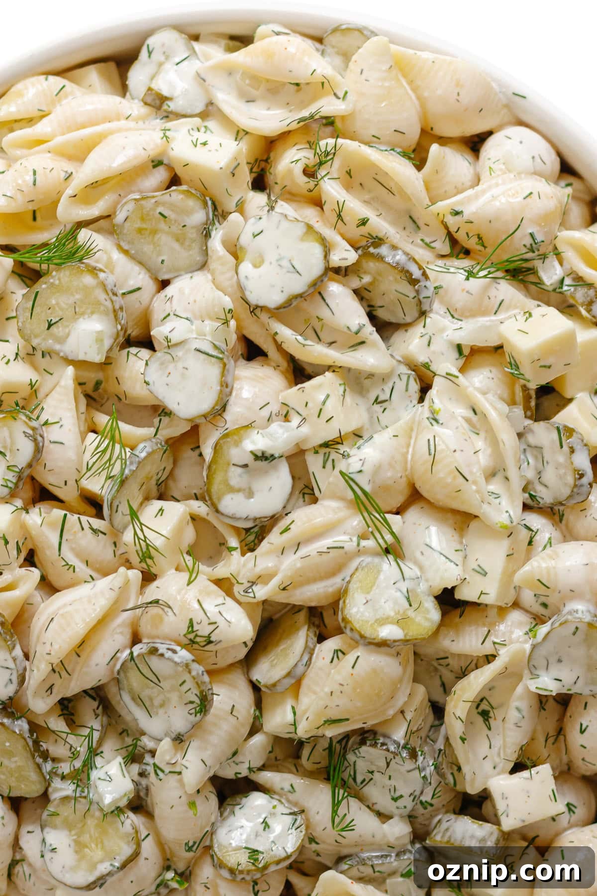 Dill pickle pasta salad in a serving bowl.